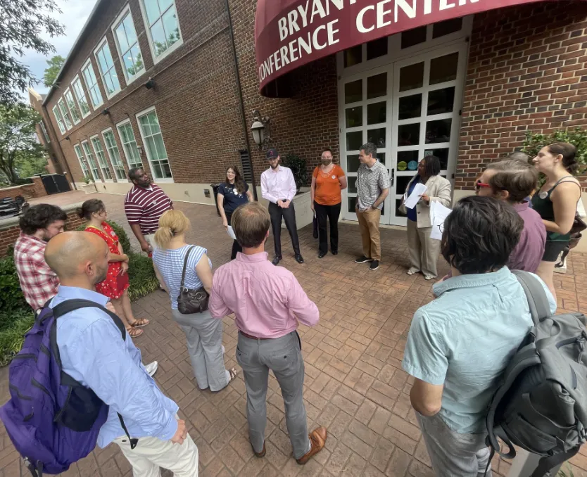 Petition delivery debrief outside of Bryant Conference Center