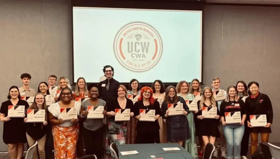 Students pose with their awards presented by United Campus Workers